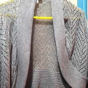 Cover up sweater, bolero.  Sparkly